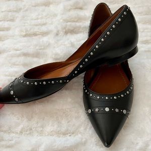 Leather Coach pointed toe flats.